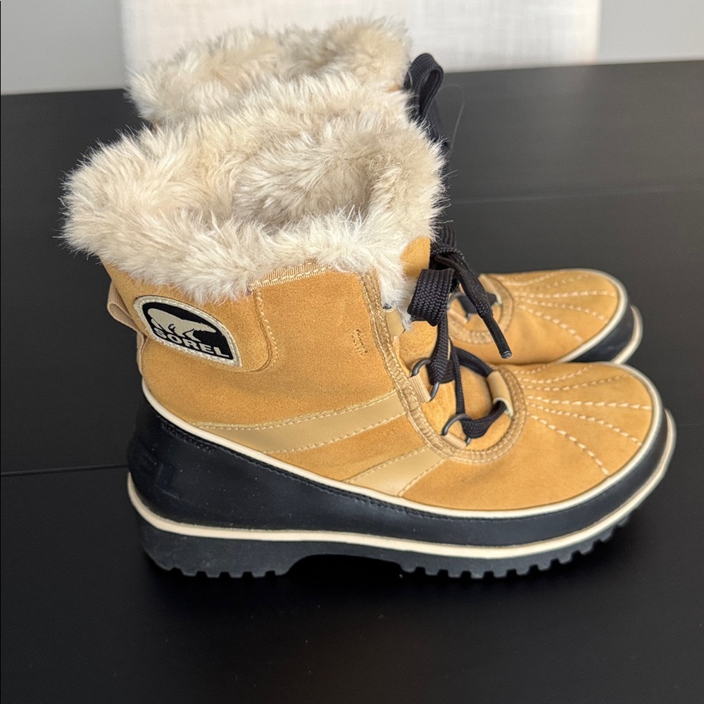 Sorel Tan and Black Winter Boots